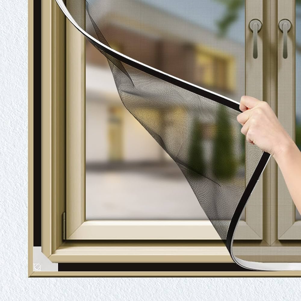 Fixed insect screen with aluminum frame installed on window in a UAE villa